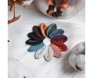Бірка пришивна, овальна, шкіра 3х1,5 "Hand made" Р010