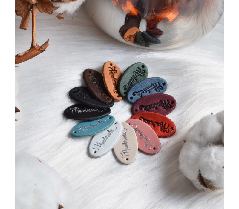 Бірка пришивна, овальна, шкіра 3х1,5 "Hand made" Р010